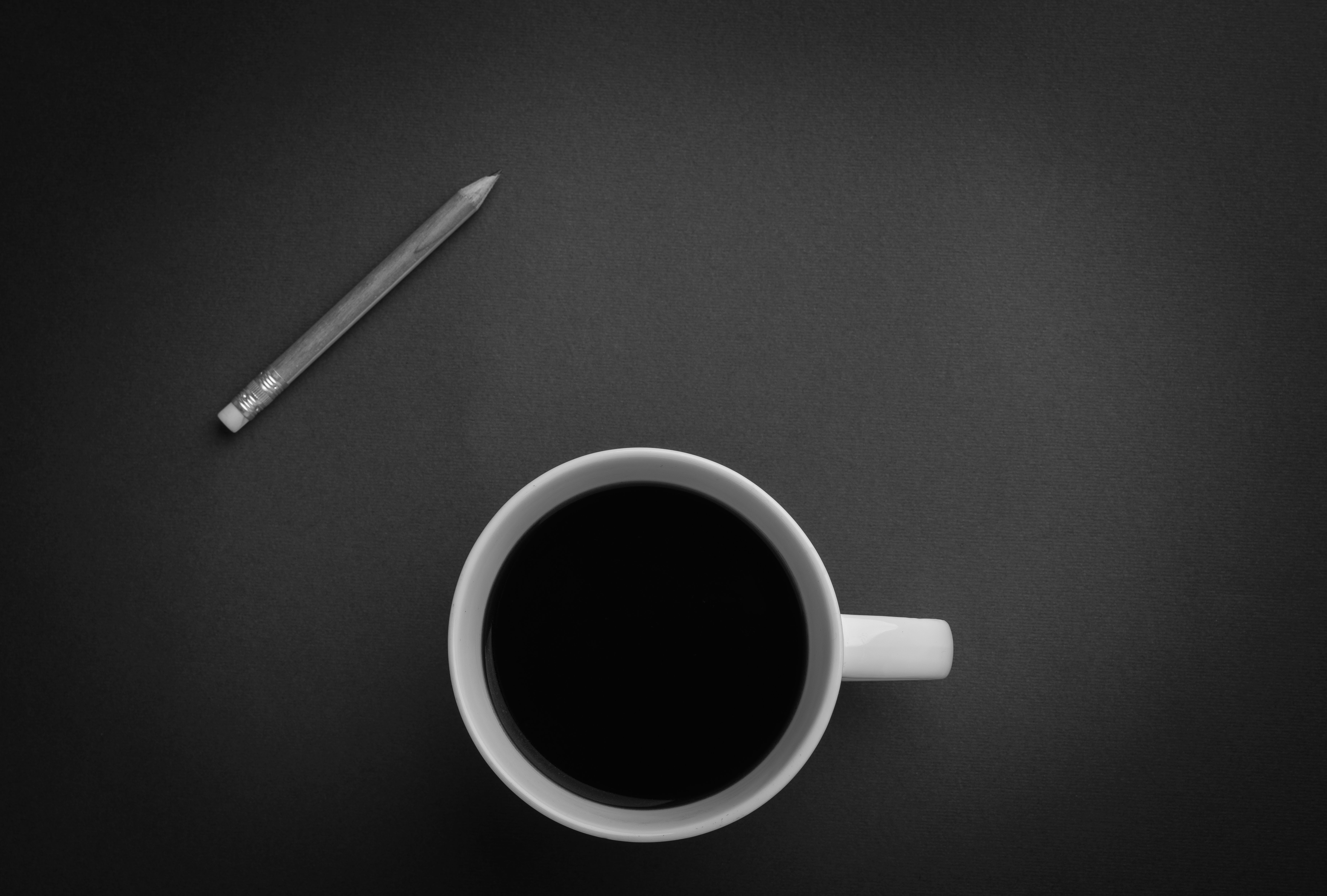 6932x4680 A Minimalist Drinks Coffee